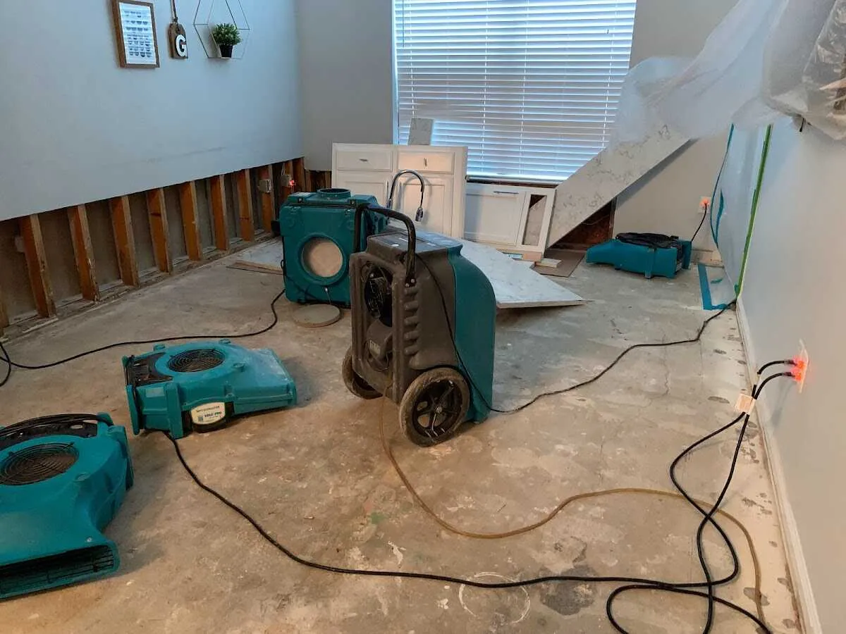 Dehumidifier in flood-cut room for Water Damage Restoration in Westmoreland